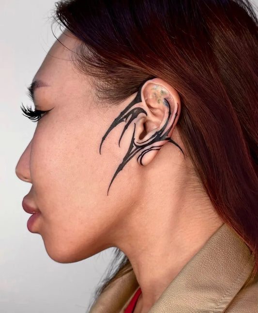 Small Blackwork Tribal Swirls Tattoo on Women Behind the Ear by @aiki.tatt