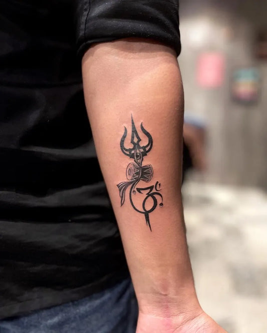 Small Blackwork Trishul Om Fish on Men Arm Tattoo by @temptink_tattoo_studio