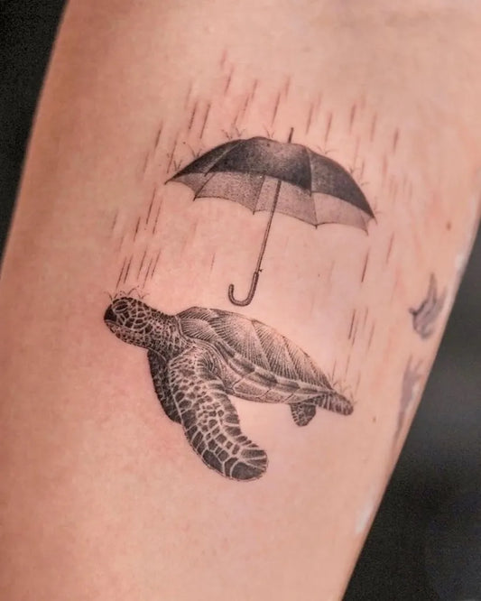 Small Blackwork Turtle Umbrella Birds Tattoo on Women Arm by @eggsy_tattoo