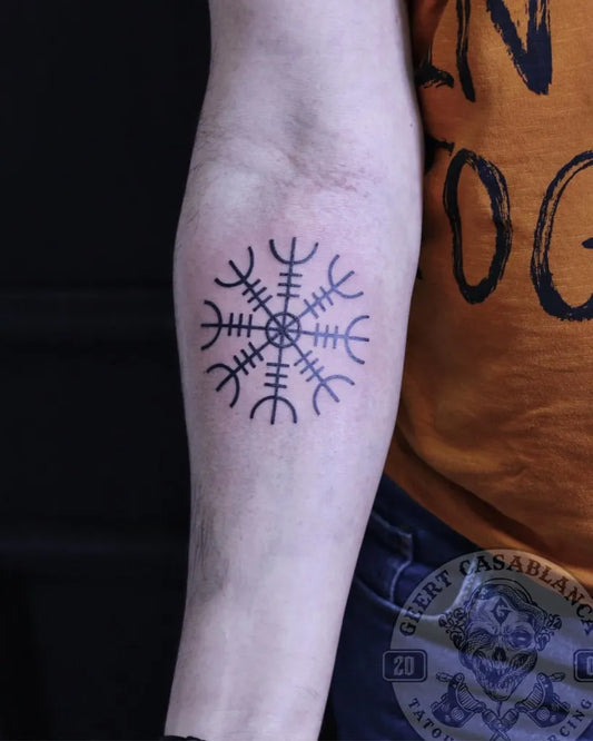 Small Blackwork Vegvisir Tattoo on Men Arm by @geert_tattoo_piercing