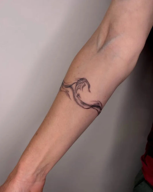 Small Blackwork Wave Tattoo on Women Forearm by @howetattoo