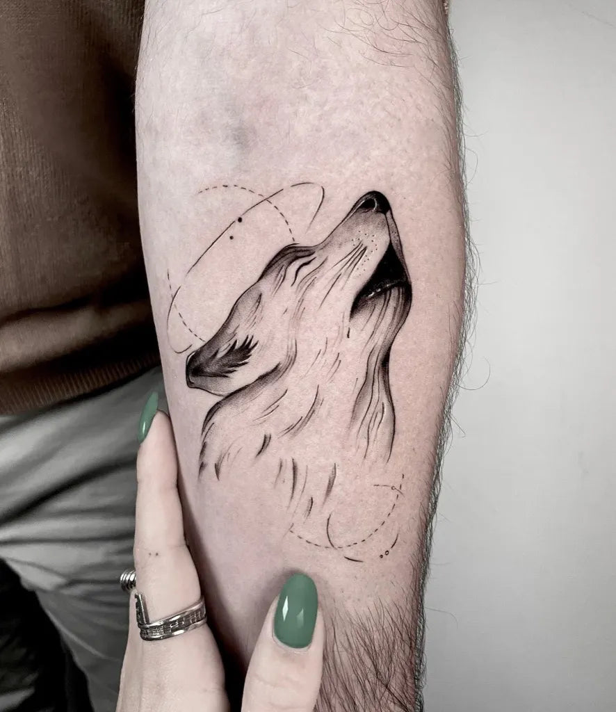 Small Blackwork Wolf on Men Arm Tattoo by @inkbox35_tattoo