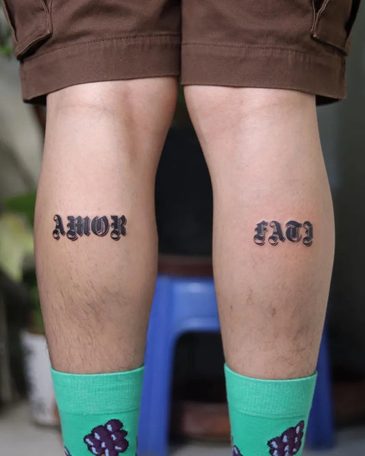 Small Blackwork Word Quote Tattoo on Men Legs by @naga_ink_master