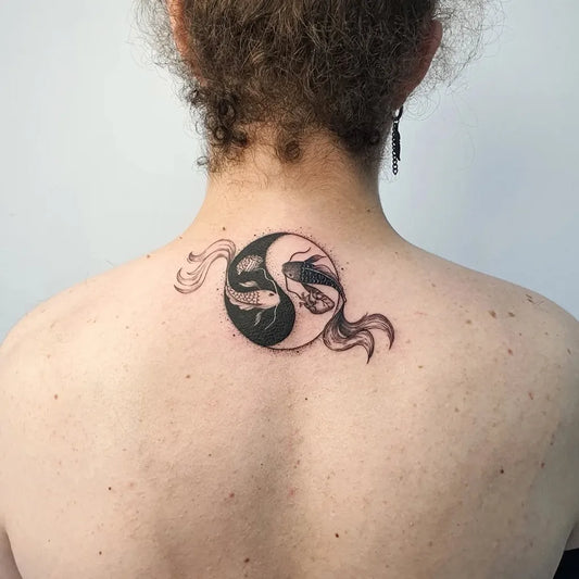 Small Blackwork Yin Yang Koi Tattoo on Women Neck by @_nono_tattoo