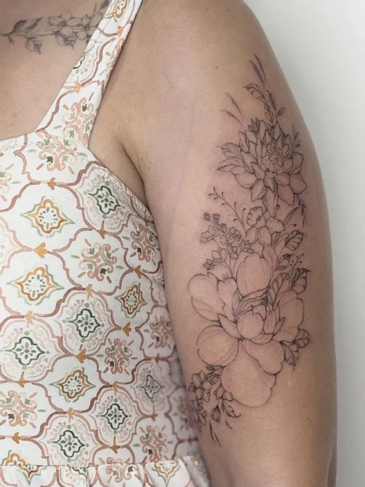 Small Botanical Floral Design on Women Arm Tattoo by @_snoefli