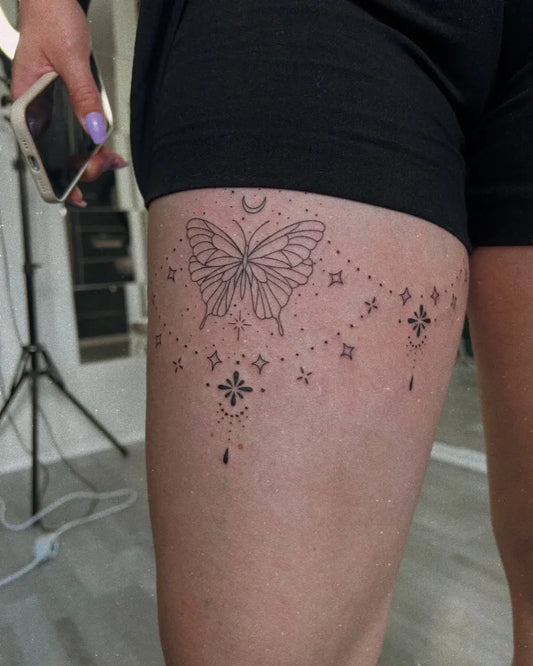 Small Butterfly Mandala Crescent Moon Butterfly on Women Thigh Tattoo by @manus.artem.tattoo