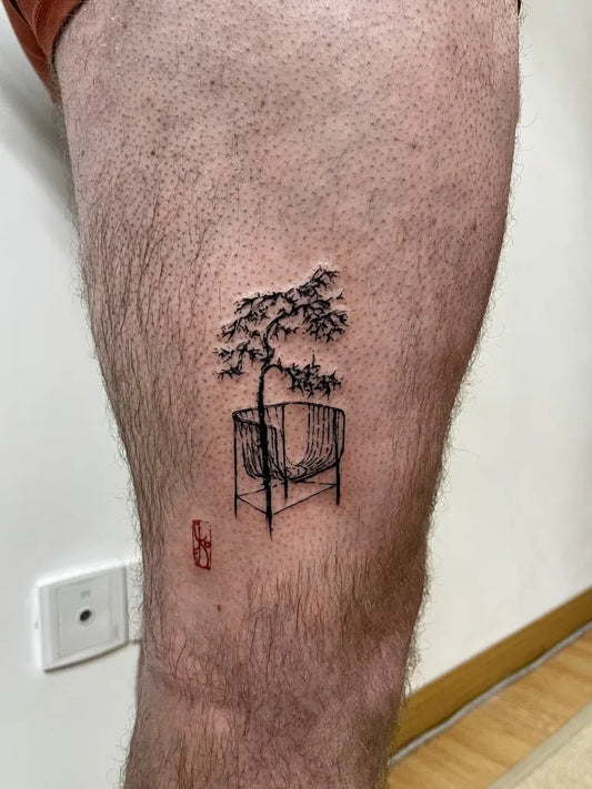 Small Chinese Bonsai Tree in Pot Tattoo on Men Thigh by @koiw_tattoo