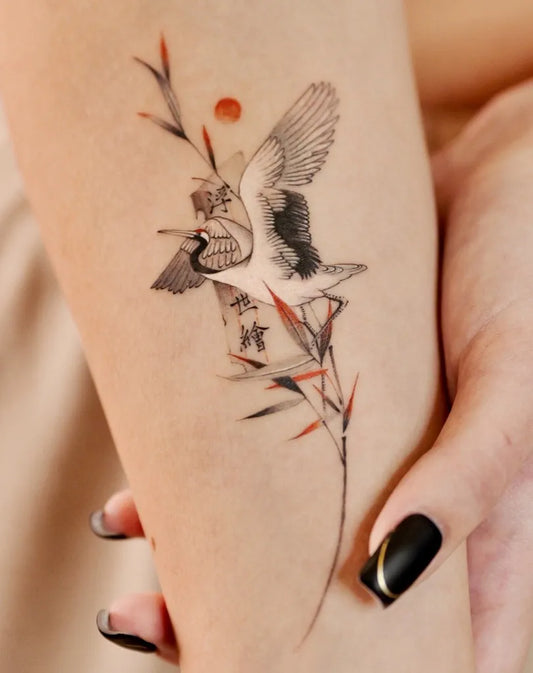 Small Chinese Swan and Bamboo Tattoo on Women Arm by @romaintattoo