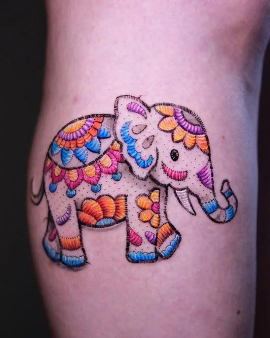 Small Color Embroidery Elephant Tattoo on Women Thigh by @ugurbolukbasi_
