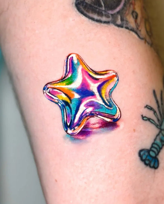 Small Color Realism Star Tattoo on Women Arm by @estee.ttt