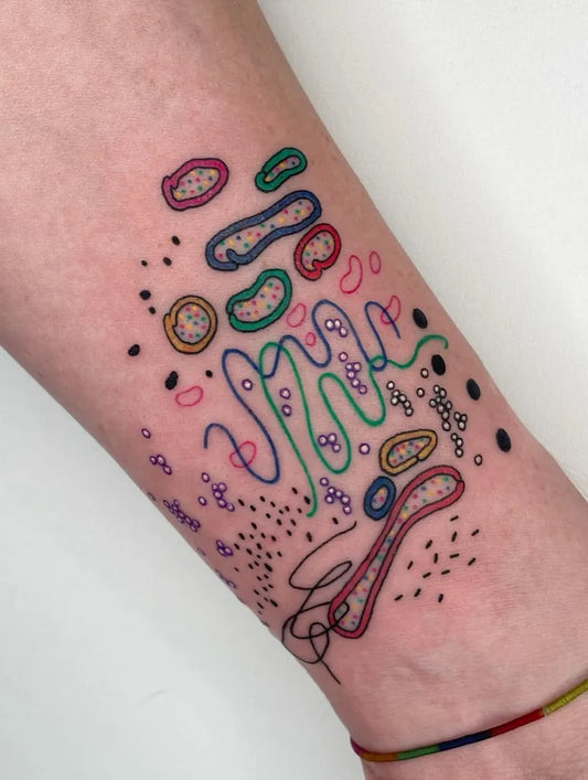 Small Colorful Abstract Shapes Tattoo on Women Forearm by @agataris