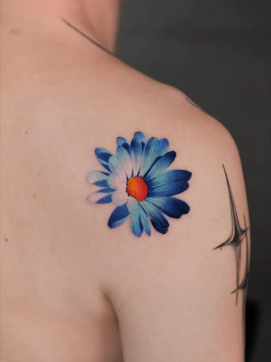 Small Colorful Daisy Tattoo on Women Shoulder by @newtattoo_yangyang