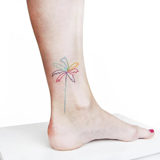 Small Colorful Outline Palm Tree Tattoo on Women Ankle by @lucysalay