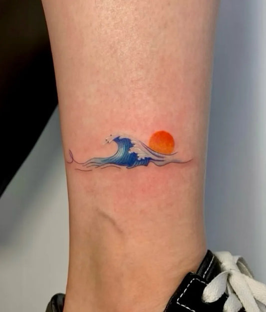 Small Colorful Wave and Sunset Tattoo on Women Ankle by @ozge