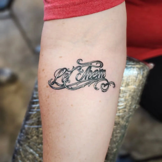Small Cursive Script Let Them Script on Women Arm Tattoo by @birdysartnest_tb