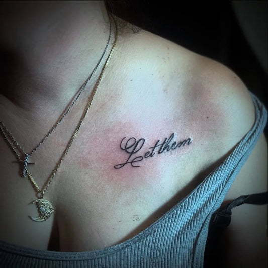Small Cursive Script Let Them on Women Shoulder Tattoo by @jess.lovesart