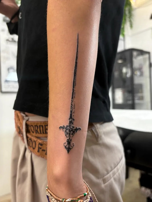 Small Cyber Sigilism Sword on Women Arm Tattoo by @taro_tattoo_
