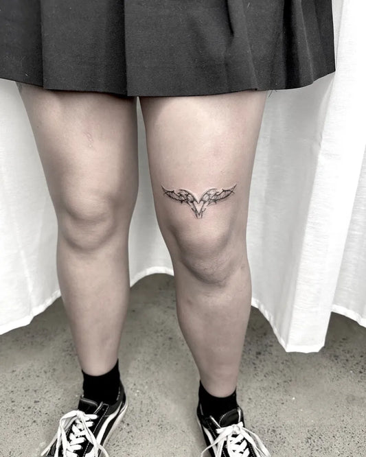 Small Cyber Sigilism Wings on Women Thigh Tattoo by @bellabae.tattoo