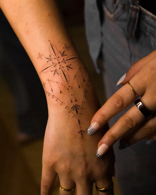 Small Delicate Compass Star on Women Wrist Tattoo by @eudaemonica__