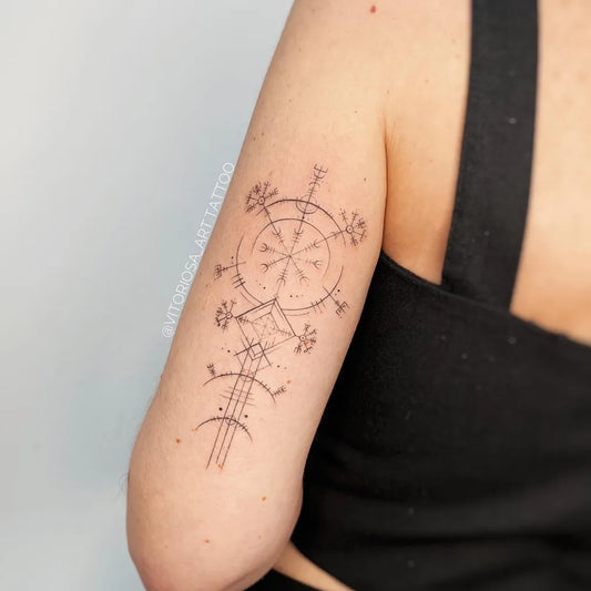 Small Dots Vegvisir Tattoo on Women UpperArm by @vitoriosa_art