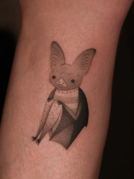 Small Dotwork Bat Tattoo on Women Forearm by @distel.tattoo