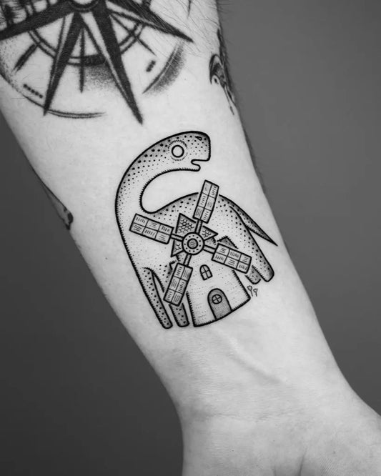 Small Dotwork Dinosaur Windmill Tattoo on Men Arm by @mike_stout_tattoo