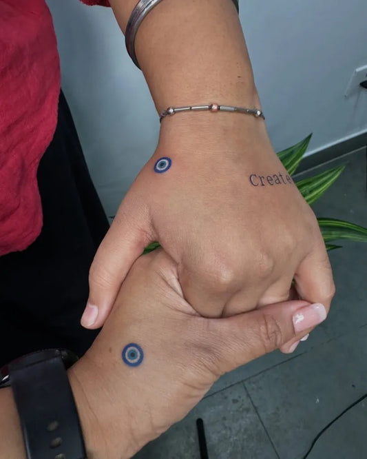 Small Dotwork Evil Eye on Women Hand Tattoo by @female_tattoo_artist_delhi