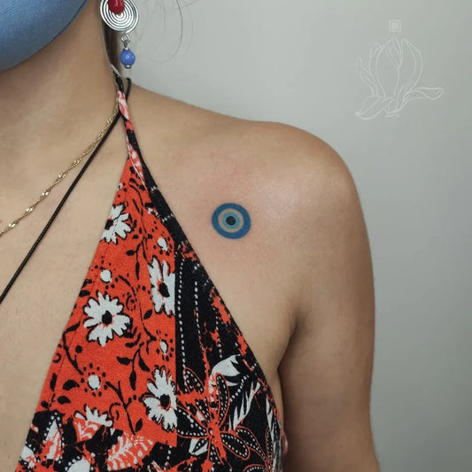Small Dotwork Evil Eye on Women Shoulder Tattoo by @lilie.ink