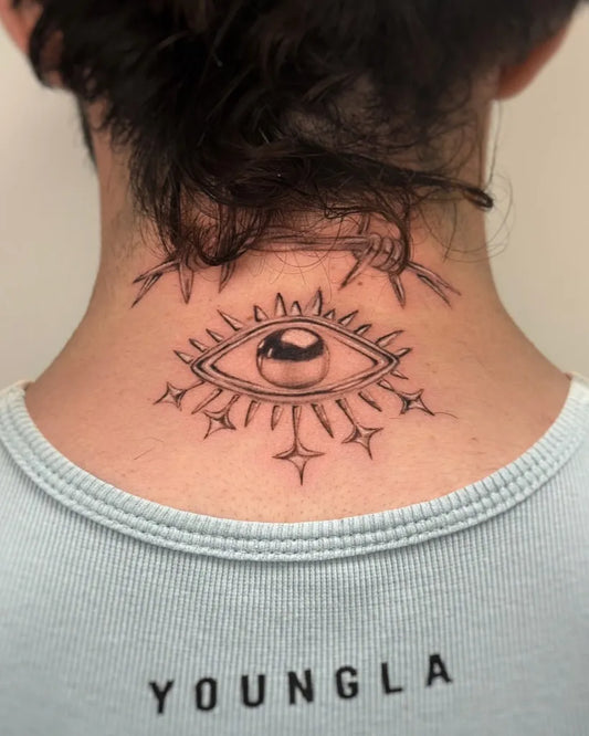 Small Dotwork Eye with Rays on Women Nape Tattoo by @tattoosbycarol