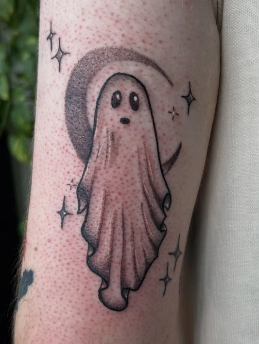 Small Dotwork Ghost and Moon Tattoo on Women Arm by @deecee.santino.tattoo