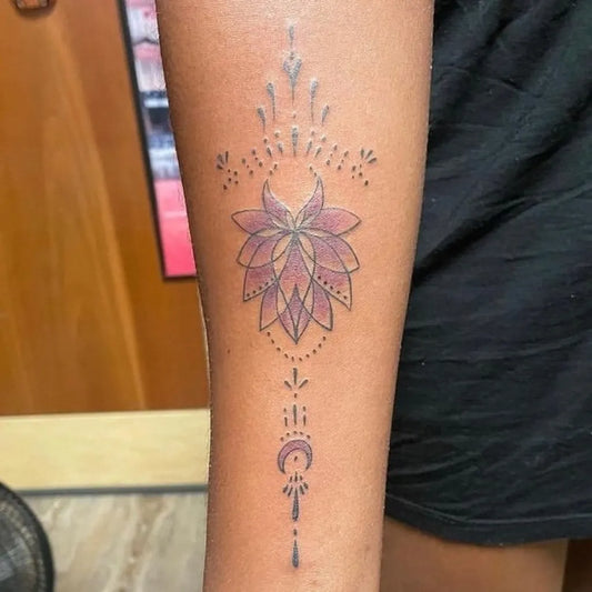 Small Dotwork Lotus Flower with Mandala and Dots on Women Arm Tattoo by @lucidartstattoo
