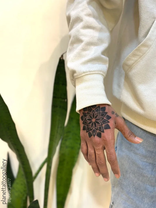 Small Dotwork Mandala Tattoo on Men Wrist by @gaurav_patil77