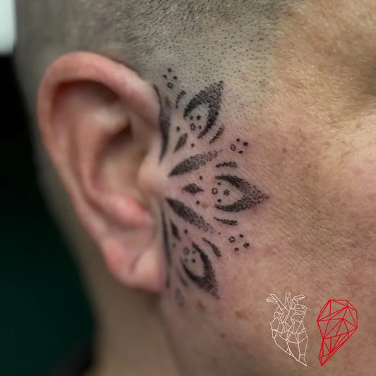 Small Dotwork Mandala Tattoo on Women Temple by @heart_of_art_studio