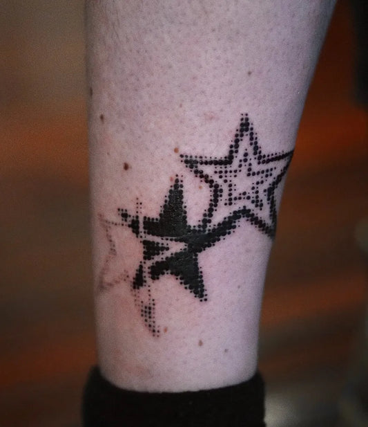 Small Dotwork Pixel Star Tattoo on Women Leg by @planetxchido