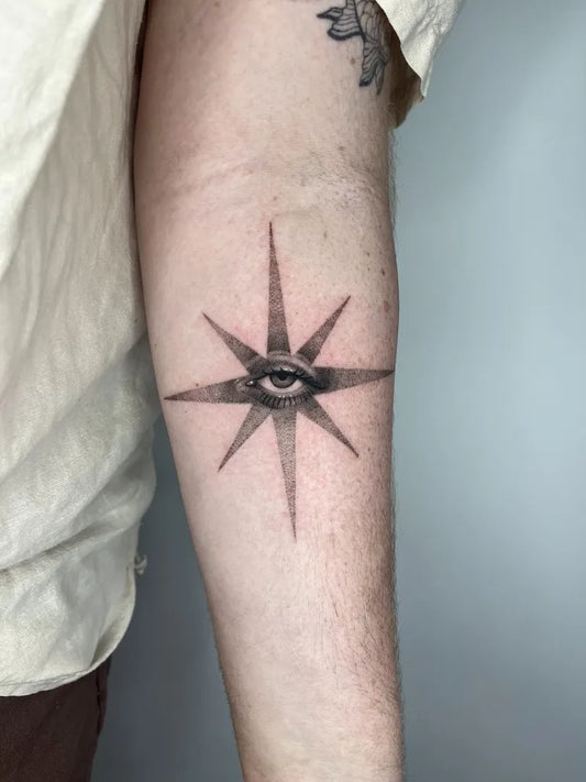 Small Dotwork Star with Eye Tattoo on Men Arm by @_saphody.inc._