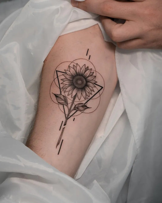 Small Dotwork Sunflower Triangle on Men Arm Tattoo by @choco.tattoo.budapest