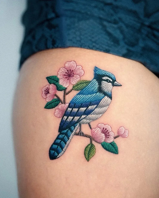 Small Embroidery Blue Jay and Cherry Blossoms Tattoo on Women Thigh by @gyeong_.tt