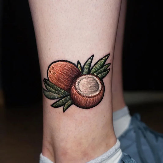 Small Embroidery Coconut and leaves Tattoo on Women Leg by @ksuarrow_tattoo