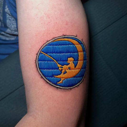 Small Embroidery Moon Boy Fishing Rod Tattoo on Women Arm by @botturatattoo