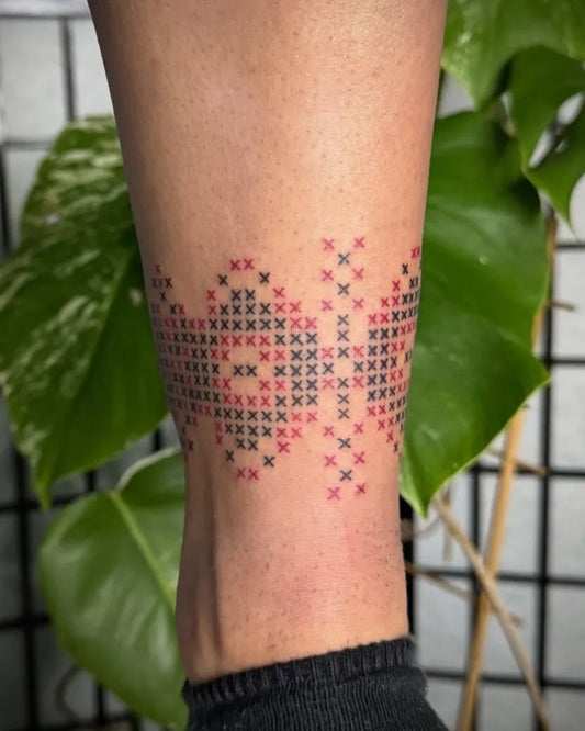 Small Embroidery Pixelated Pattern Tattoo on Women Ankle by @mastilnicatattoo