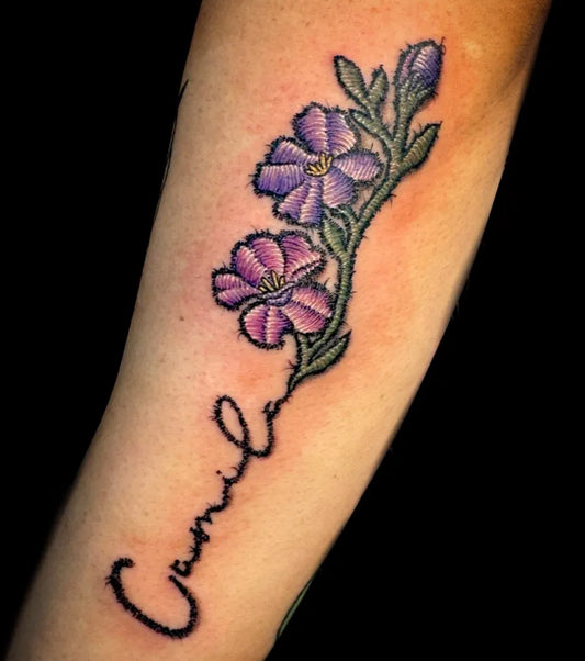 Small Embroidery Purple Flowers and Camille Script Women Arm by @tattoosbyraychill