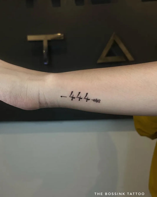 Small Fine Line 444 Arrow on Women Wrist Tattoo by @thebossink.tattoo