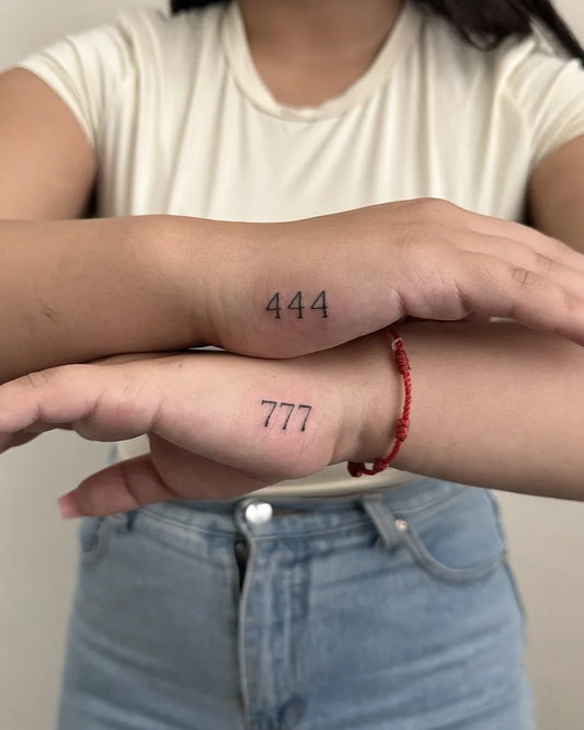 Small Fine Line 444 and 777 Numbers Tattoo on Women Wrist by @pulsar.tattoo
