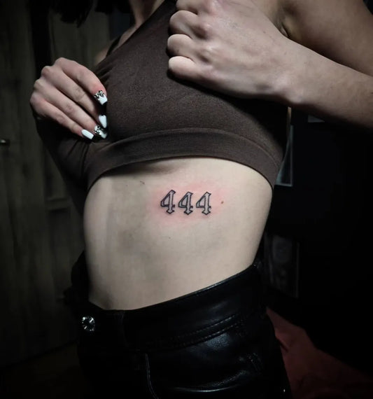 Small Fine Line 444 on Women Rib Tattoo by @kowalski.tattoo