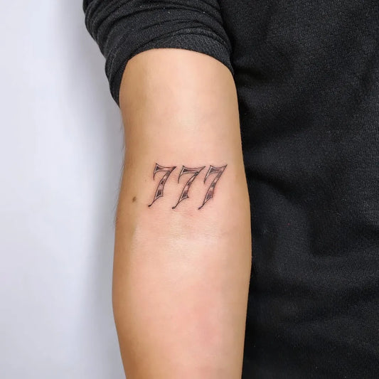 Small Fine Line 777 Tattoo on Men Arm by @jhayglez