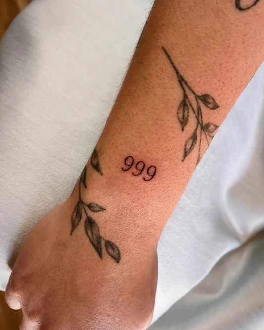 Small Fine Line 999 Leaves Tattoo on Women Wrist by @tt.studio.21