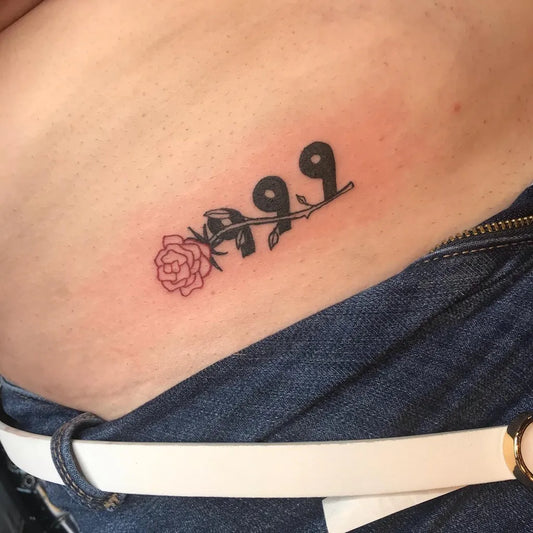 Small Fine Line 999 Rose Tattoo on Women Hip by @tattoosbyevi