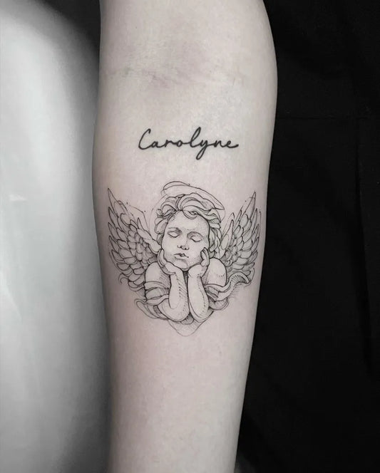 Small Fine Line Angel Wings Tattoo on Women Arm by @deadrabbitink