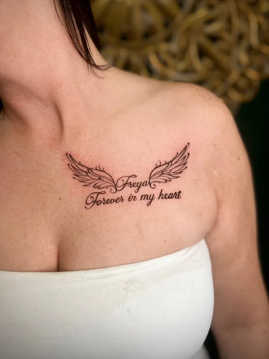 Small Fine Line Angel Wings and Forever in My Heart on Women Shoulder Tattoo by @inksmithtattooclonmel_official
