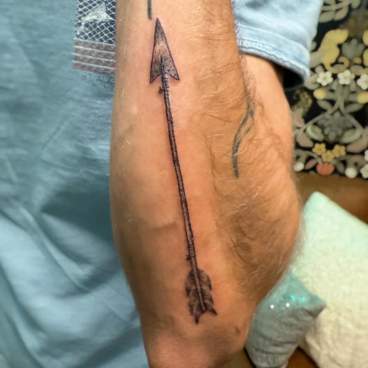 Small Fine Line Arrow Tattoo on Men Arm by @brianablohm_tattoo